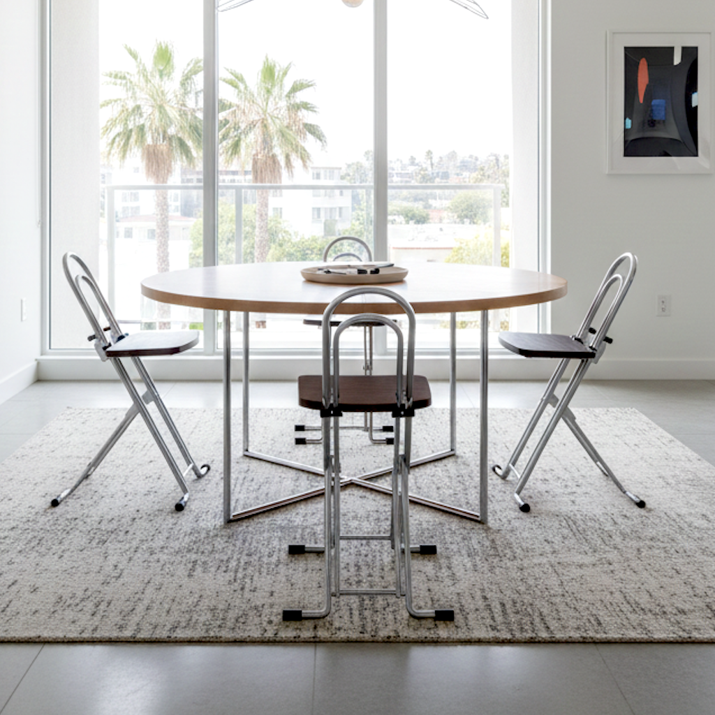 4 petite chairs in a living room